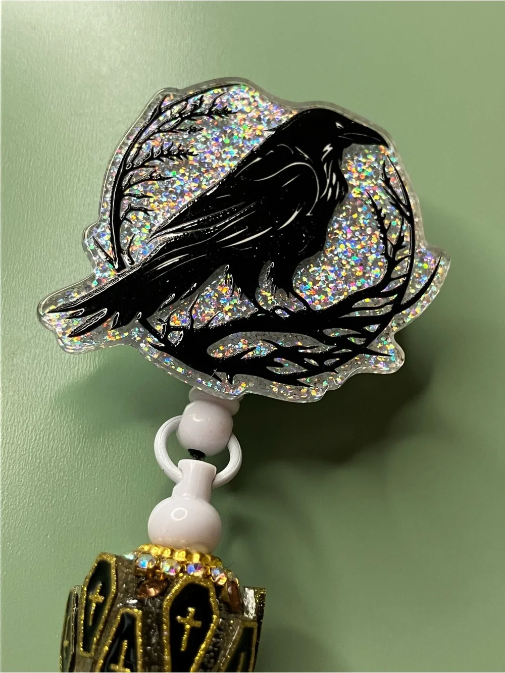 Raven Silver Sparkle Badge Reel with Coffin Beads • Handmade Halloween Work Gift